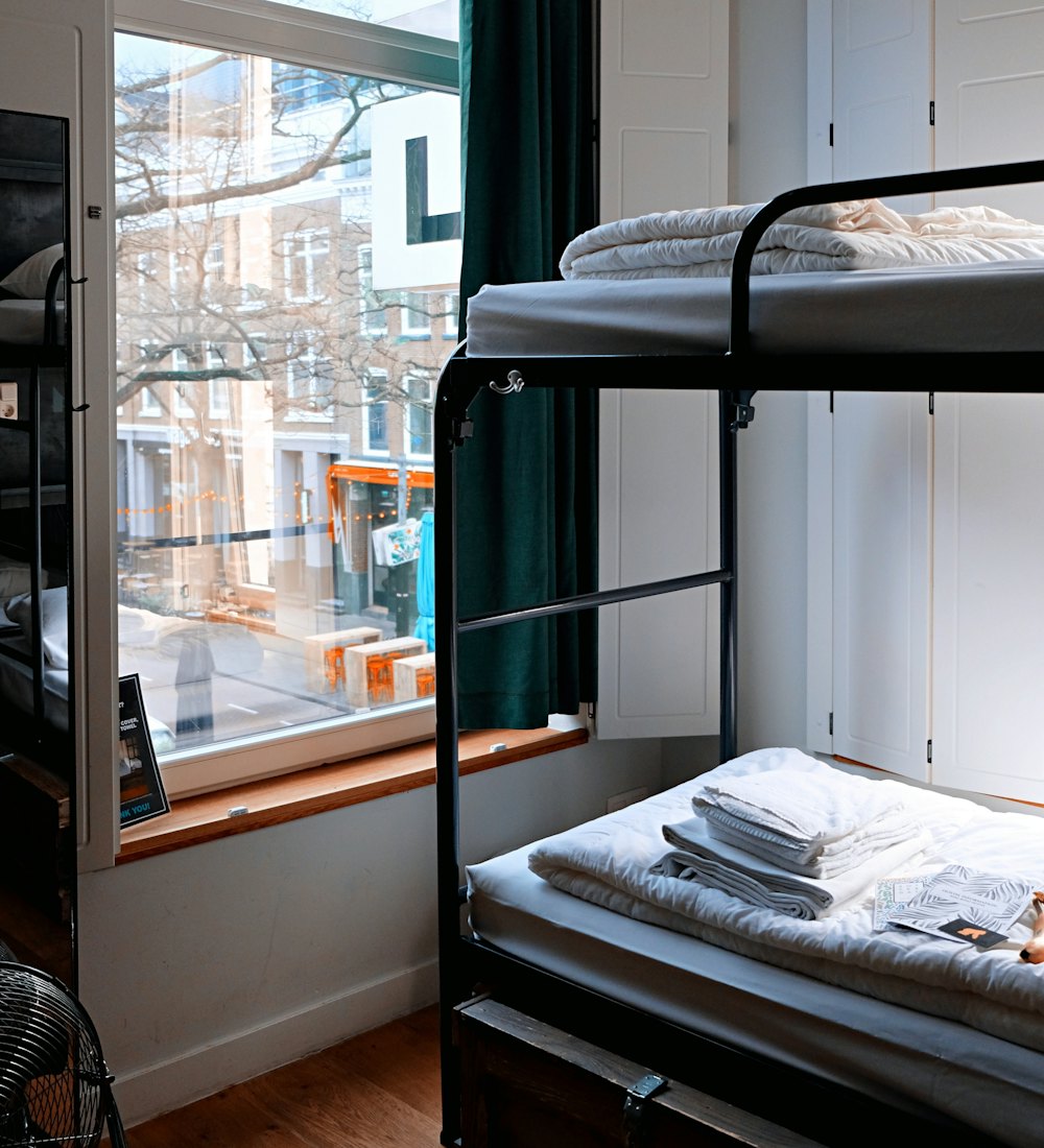 Bunk beds in a bright PG room
